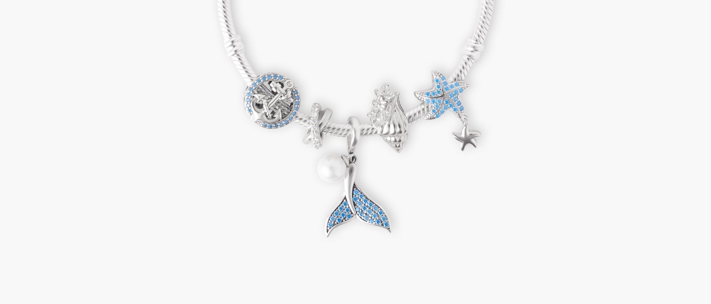 Armband mit Charms Set OCEAN WITHIN aus 925 Sterling-Silber, Flatlay – Charmerie
