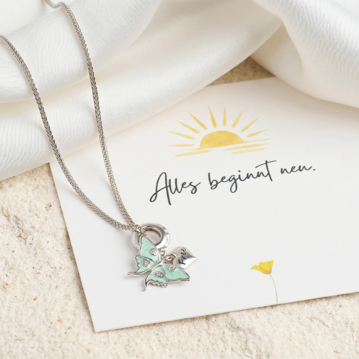 Kette mit mintgrünem Schmetterling-Anhänger aus 925 Silber, Geschenkkarte "Alles beginnt neu"